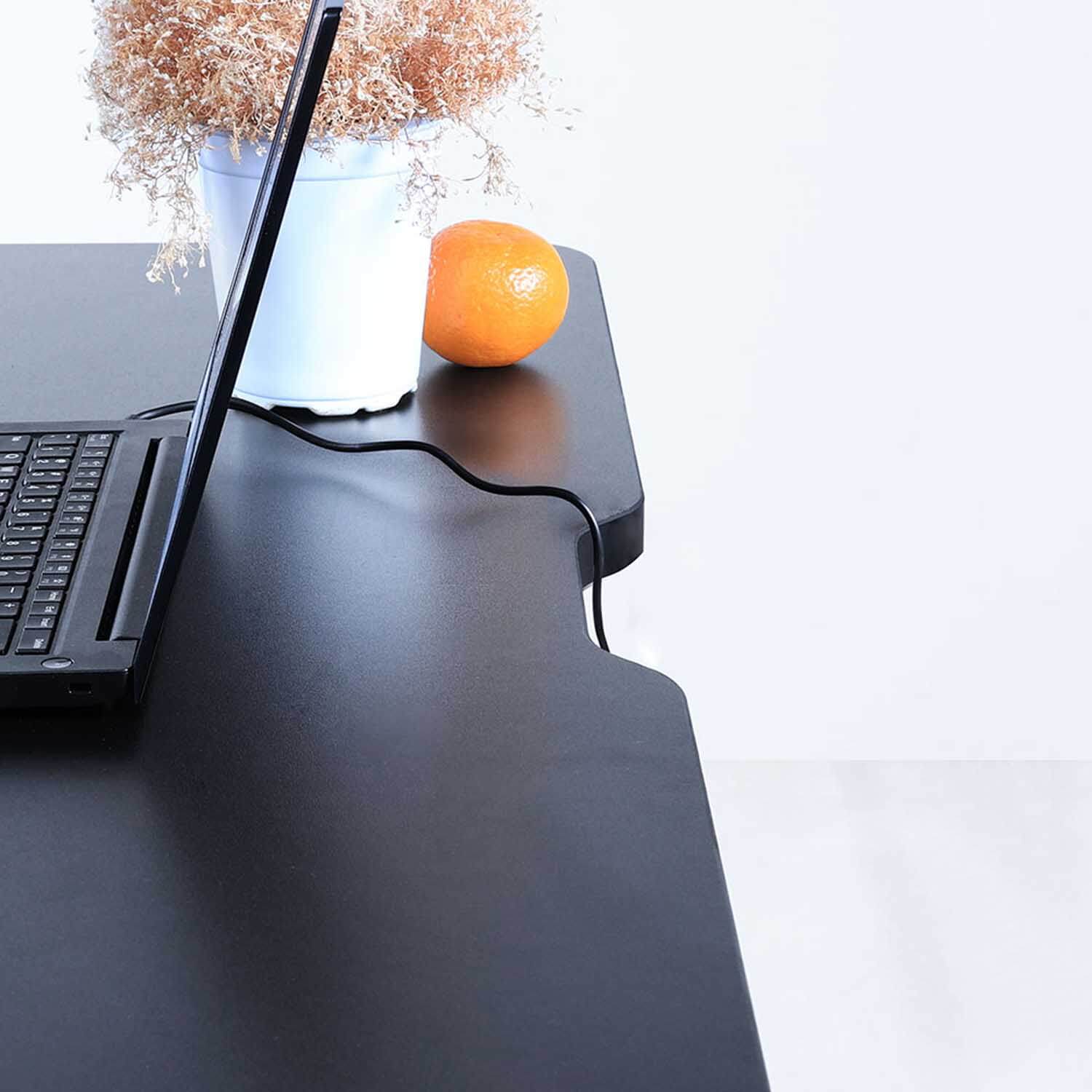 Black home office standing desk with easy cable management