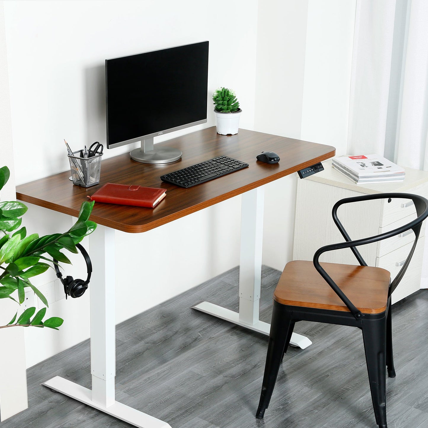 Walnut stand up desk matches with your home or office design